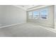 Bright and airy bedroom with carpet and large windows at 9349 Russell Cir, Arvada, CO 80007