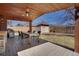 Backyard with a wooden deck and dining space at 748 S Grape St, Denver, CO 80246