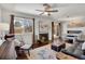 Inviting living room with fireplace, hardwood floors, and a cozy seating area with natural light at 748 S Grape St, Denver, CO 80246