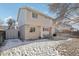 Expansive backyard featuring a patio and storage shed, ideal for storage and activities at 13033 Birch Dr, Thornton, CO 80241