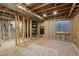 Unfinished basement with exposed framing, perfect for customization and future expansion at 13033 Birch Dr, Thornton, CO 80241