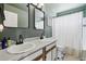 Charming bathroom with a double sink vanity and modern fixtures at 13033 Birch Dr, Thornton, CO 80241