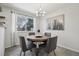 Charming dining room with modern decor, lots of light, and stylish furniture at 13033 Birch Dr, Thornton, CO 80241