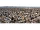 Wide aerial view of the residential community with city skyline, showcasing the neighborhood layout and mountain views at 3251 N Madison St, Denver, CO 80205