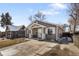 Charming single-Gathering home with a well-manicured lawn and inviting front porch at 3251 N Madison St, Denver, CO 80205