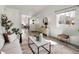 Bright living room with a modern interior design, neutral tones, and lots of natural light at 3251 N Madison St, Denver, CO 80205
