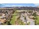Breathtaking aerial shot of the community with green spaces and mature trees at 10624 W Berry Pl, Littleton, CO 80127