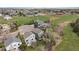 Aerial view showcasing homes with well-maintained lawns in a serene neighborhood setting at 10624 W Berry Pl, Littleton, CO 80127