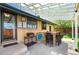 Outdoor patio featuring a dining set and grill, perfect for backyard barbecues and outdoor gatherings at 5485 S Lakeview St, Littleton, CO 80120
