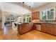 Kitchen featuring granite countertops, eat in island, and stainless-steel appliances at 13794 E Caley Dr, Englewood, CO 80111