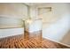 Open-concept living room with hardwood floors, a chandelier, and large windows at 9630 W La Salle Ave, Lakewood, CO 80227