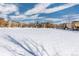 Snow-covered neighborhood park with playground visible at 5596 W 72Nd Dr, Arvada, CO 80003