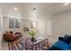 Finished basement with plush carpet, recessed lighting, and cozy seating area at 7720 Brown Bear Way, Littleton, CO 80125