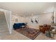 Finished basement with plush carpet, recessed lighting, and modern furnishings at 7720 Brown Bear Way, Littleton, CO 80125