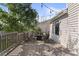 Outdoor deck featuring a wooden railing, string lights, and outdoor seating at 7720 Brown Bear Way, Littleton, CO 80125