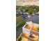 Aerial view of the house with rooftop deck, brick facade, and neighborhood setting at 1052 N Knox Ct, Denver, CO 80204