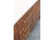 Elegant bathroom drawer detail with modern bronze pulls and gray herringbone tile at 1052 N Knox Ct, Denver, CO 80204