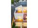 Exterior shot of home featuring a rooftop decks, a brick facade, and private garage at 1052 N Knox Ct, Denver, CO 80204