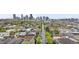 Stunning aerial view of the neighborhood, city skyline, and tree-lined streets at 3045 Arapahoe St, Denver, CO 80205