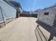 Large, gated concrete backyard, perfect for parking or outdoor activities at 3045 Arapahoe St, Denver, CO 80205