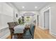 Charming dining room with wood floors and a long table set for a delightful meal at 3045 Arapahoe St, Denver, CO 80205