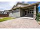 Charming backyard with a covered patio, manicured lawn, and privacy fence at 15392 W 49Th Ave, Golden, CO 80403