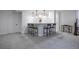 Finished basement with a sleek bar area featuring pendant lighting and stylish stools at 15392 W 49Th Ave, Golden, CO 80403