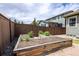 Raised garden bed with rich soil is perfect for cultivating your favorite flowers or vegetables at 15392 W 49Th Ave, Golden, CO 80403