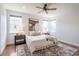 Serene main bedroom with soft lighting, a cozy rug, and neutral tones, creating a relaxing retreat at 15392 W 49Th Ave, Golden, CO 80403
