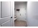 Bright mudroom featuring a built-in bench, storage rack, and access to the home's entrance at 15392 W 49Th Ave, Golden, CO 80403