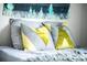 Comfortable bedroom pillows with modern design and soothing colors for a restful atmosphere at 3202 S Dahlia St, Denver, CO 80222