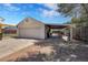 Backyard features a basketball hoop, a garage, and a covered patio area at 2226 Fulton St, Aurora, CO 80010
