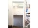 An interior view of an attached garage leading to another room at 2226 Fulton St, Aurora, CO 80010