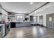 Modern kitchen with stainless steel appliances and open shelving at 2226 Fulton St, Aurora, CO 80010
