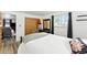 Bedroom with a window, closet and doorway into another room at 4505 W Gill Pl, Denver, CO 80219
