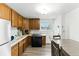Kitchen area with an open view and an eat-in kitchen area with lots of natural light at 4505 W Gill Pl, Denver, CO 80219