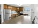 Bright eat-in kitchen featuring stainless steel appliances and lots of counter space at 4505 W Gill Pl, Denver, CO 80219