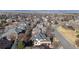 Aerial view of a residential neighborhood showcasing well-maintained homes and landscaping at 1313 Jade Ln, Longmont, CO 80504