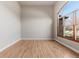 Bright and airy living room showcasing hardwood floors and a large window with natural light at 1313 Jade Ln, Longmont, CO 80504