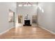 Inviting living room with high ceilings, natural light, and a sleek black fireplace at 1313 Jade Ln, Longmont, CO 80504