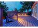 Cozy back deck featuring a relaxing hot tub and stylish lighting at 16291 E 7Th Dr, Aurora, CO 80011