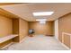 Finished basement area with neutral walls, carpet, and flexible space for activities at 16291 E 7Th Dr, Aurora, CO 80011