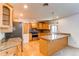 Well-appointed kitchen with granite countertops, stainless steel appliances, and ample cabinet space at 16291 E 7Th Dr, Aurora, CO 80011