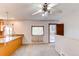 Open-concept kitchen space with modern appliances and a view into the adjacent dining area at 16291 E 7Th Dr, Aurora, CO 80011