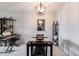 Dining room featuring modern lighting, a decorative shelf, and Beatles artwork at 7770 W 38Th Ave # 207, Wheat Ridge, CO 80033