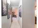 View of the hallway displaying neutral colored walls and carpet leading toward another room at 7770 W 38Th Ave # 207, Wheat Ridge, CO 80033