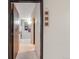 Inviting hallway with neutral tones and stylish beach themed decorations on the wall at 7770 W 38Th Ave # 207, Wheat Ridge, CO 80033