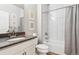Stylish bathroom with modern fixtures, framed prints, and a shower-tub combo at 12820 Inca St, Westminster, CO 80234