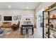 Inviting dining area with stylish decor, seamless living room connection, and ample light at 12820 Inca St, Westminster, CO 80234