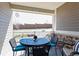Covered patio with outdoor seating, perfect for relaxing and entertaining at 12820 Inca St, Westminster, CO 80234
